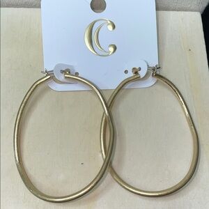 NWT gold tone, wavy large hoops